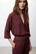 Blusa over con drappeggio