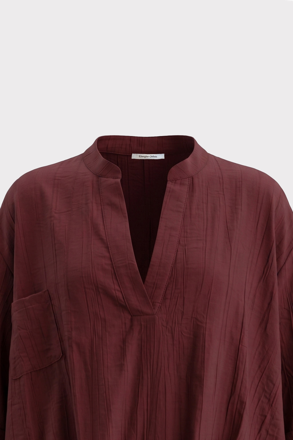 Blusa over con drappeggio