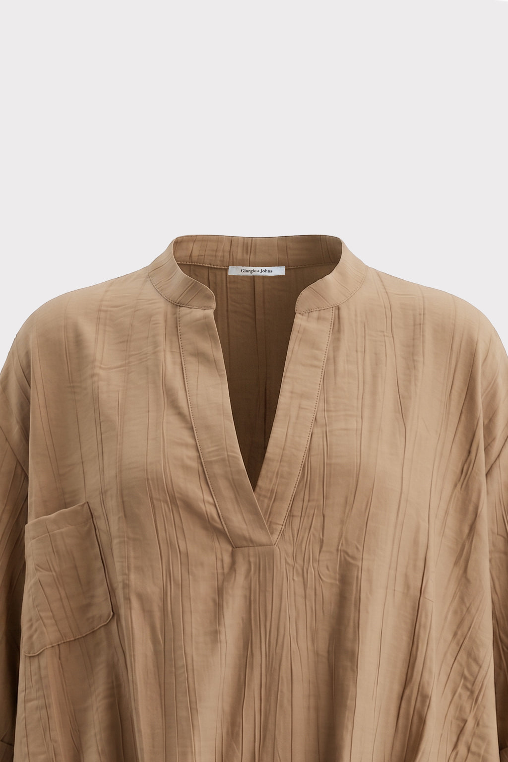 Blusa over con drappeggio