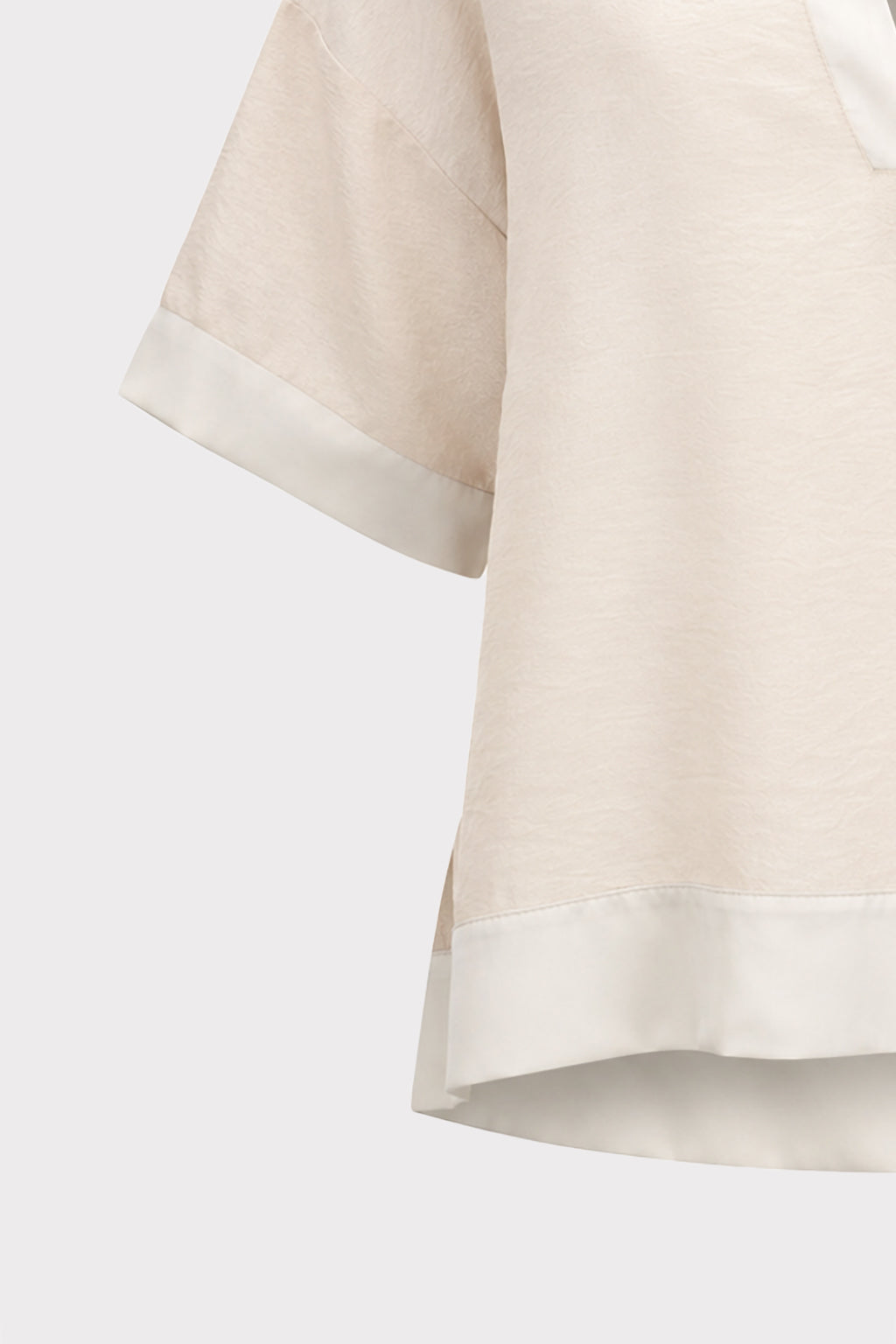Blusa over inserti in raso