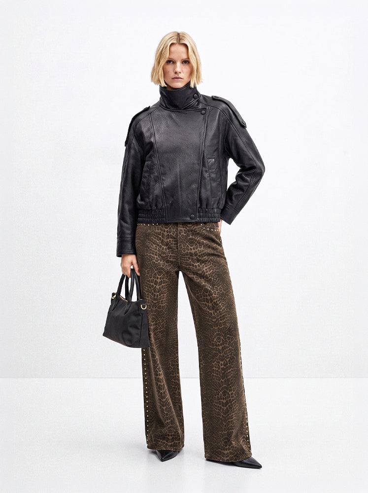 Jeans stampa macula con borchie