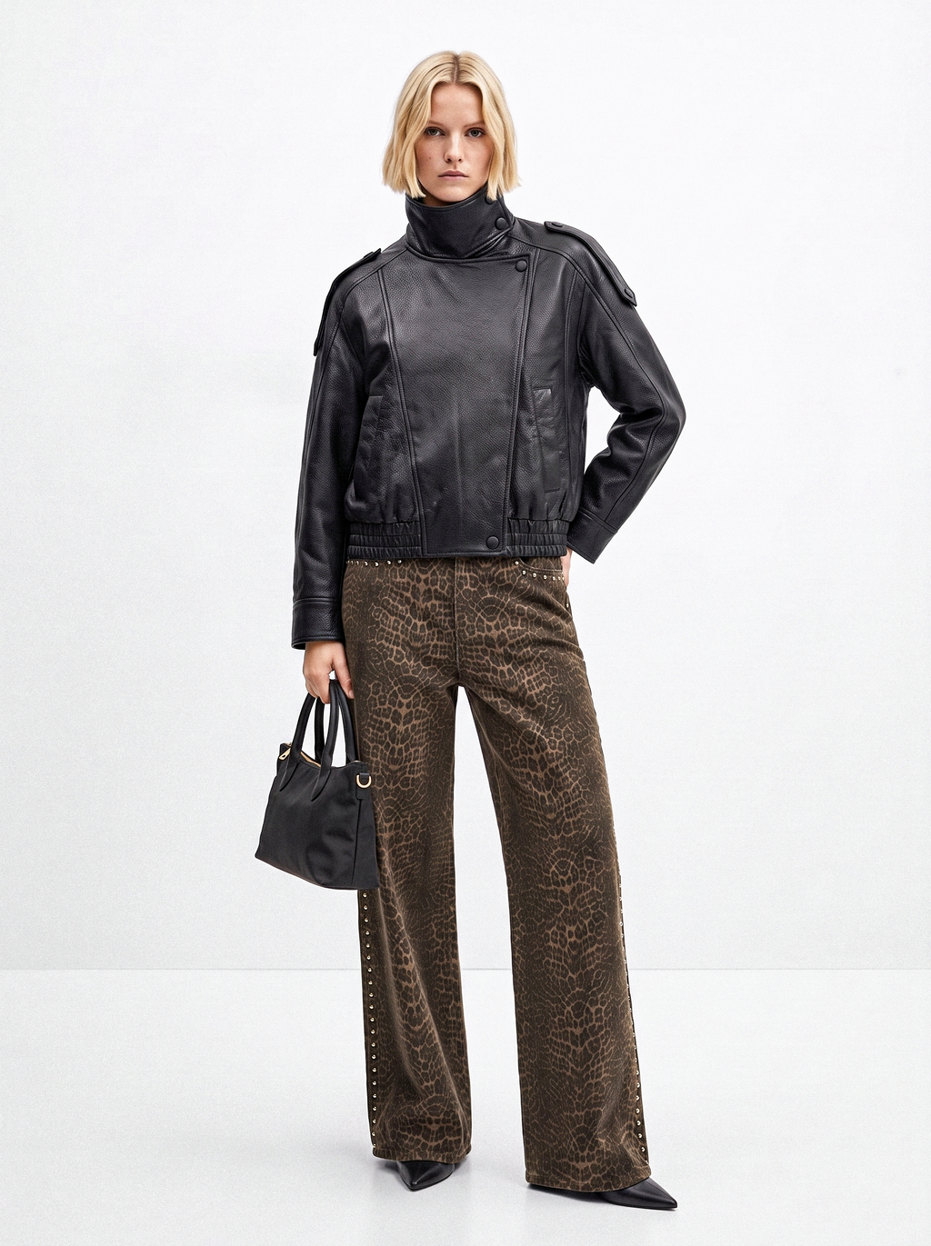 Jeans stampa macula con borchie