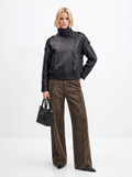 Jeans stampa macula con borchie