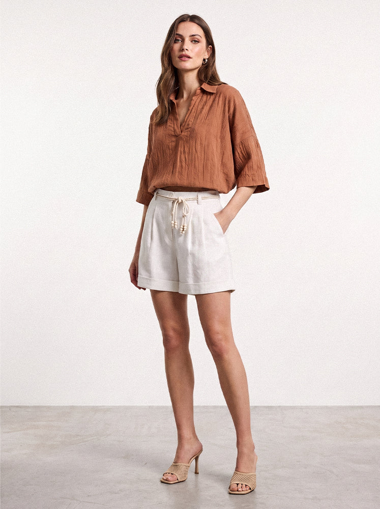 Blusa polo over in viscosa