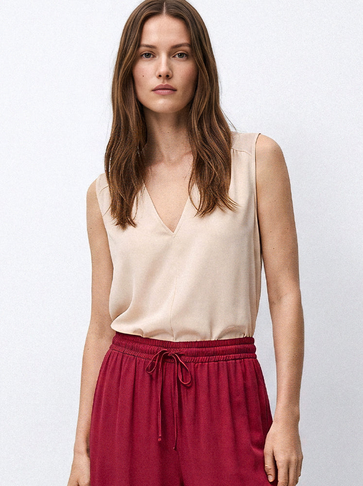 Top spalla larga scollo a V