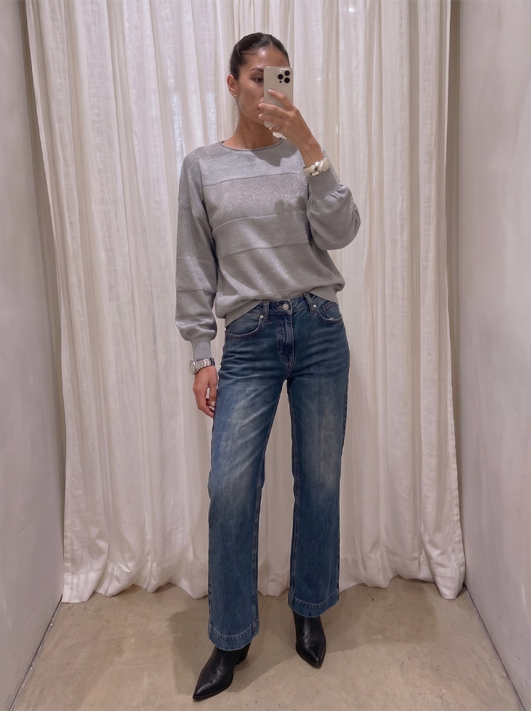 Jeans straight leg e maxi orlo