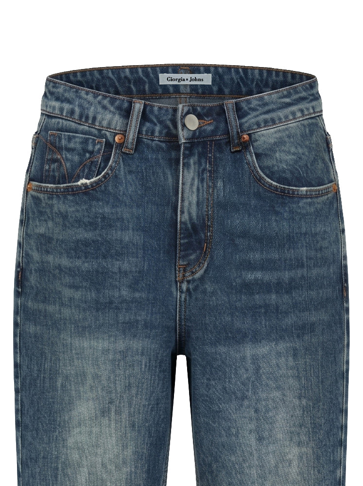 Jeans straight leg e maxi orlo