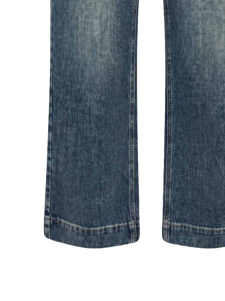 Jeans straight leg e maxi orlo