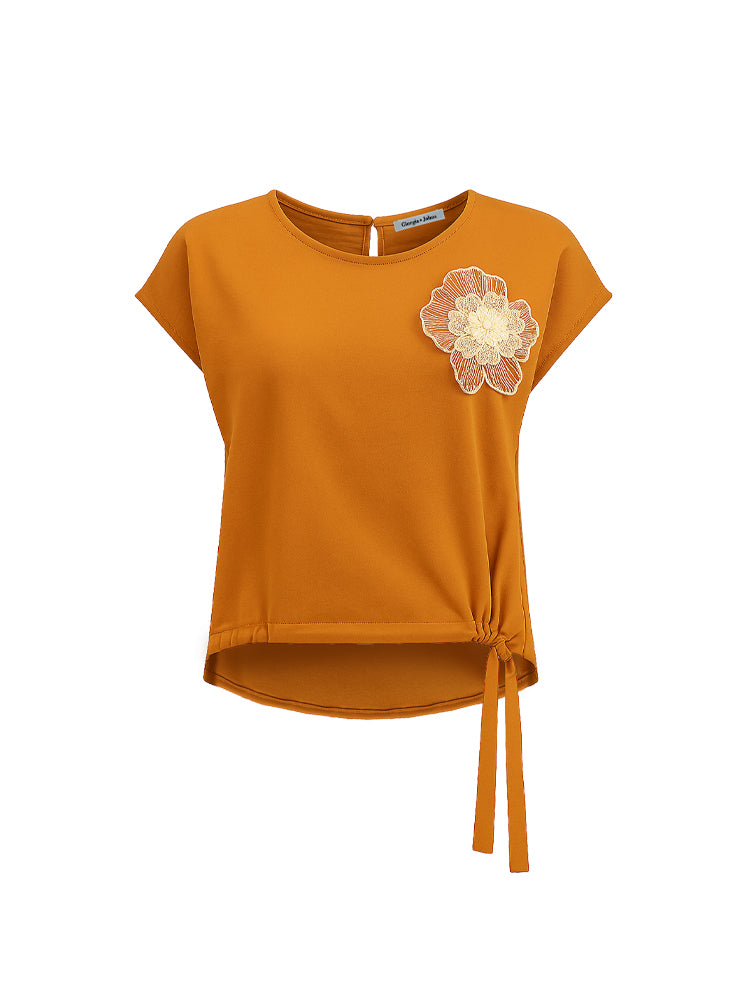 Blusa con coulisse e patch fiore