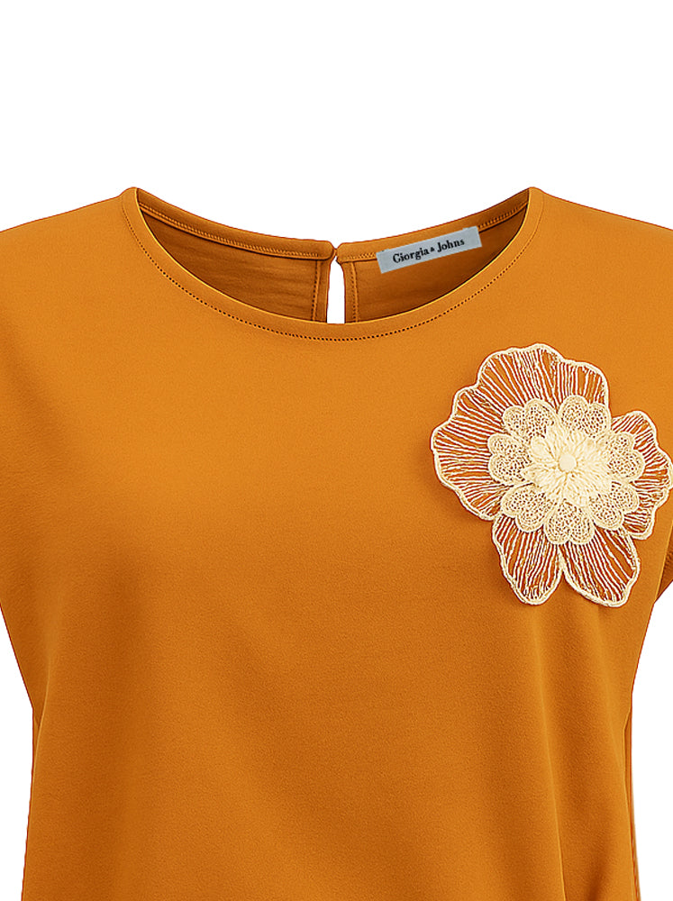 Blusa con coulisse e patch fiore