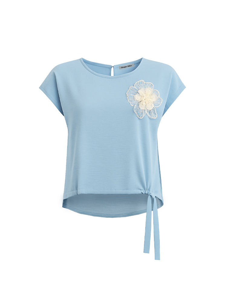 Blusa con coulisse e patch fiore