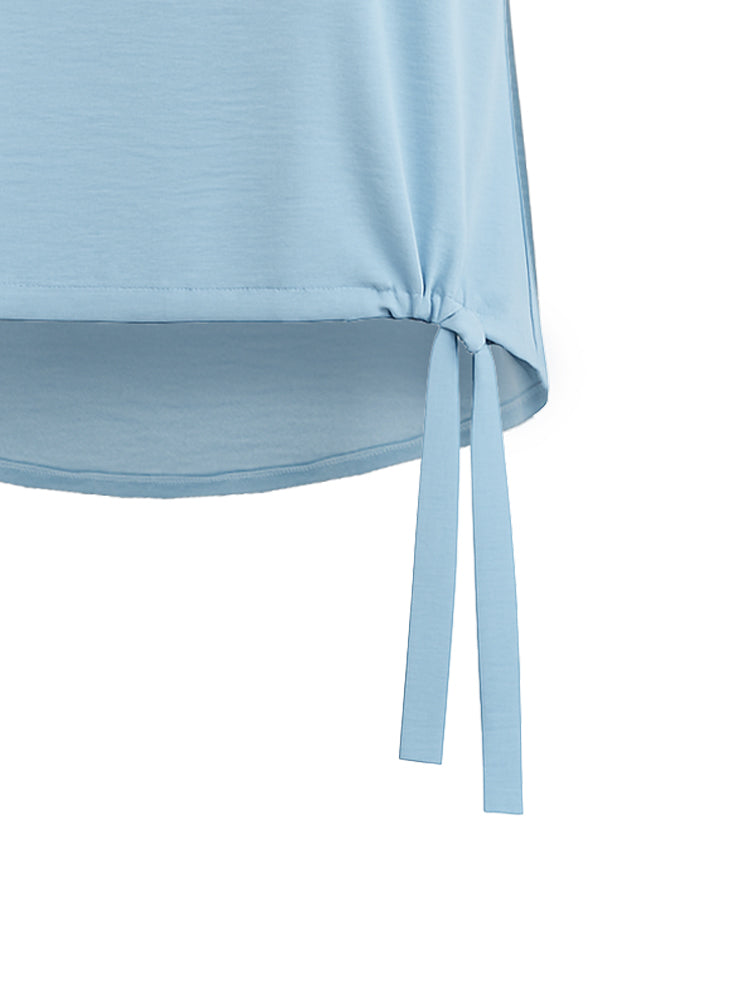 Blusa con coulisse e patch fiore