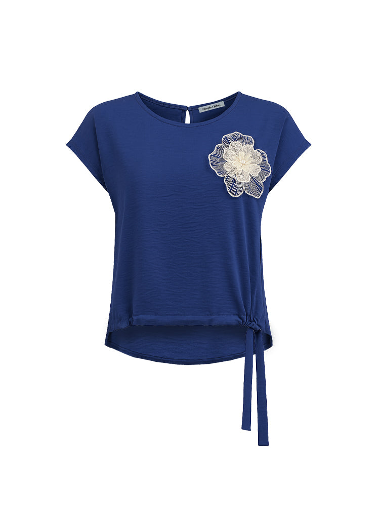 Blusa con coulisse e patch fiore