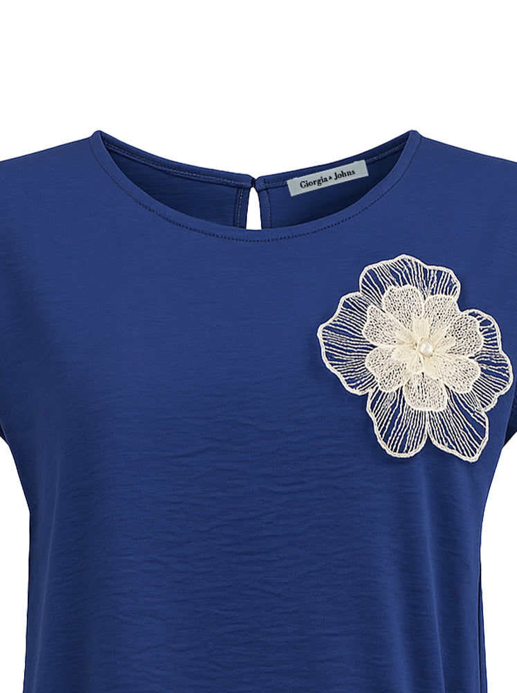 Blusa con coulisse e patch fiore