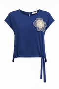 Blusa con coulisse e patch fiore