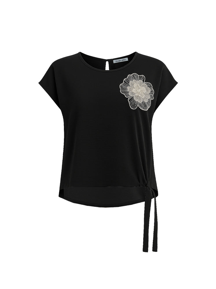 Blusa con coulisse e patch fiore