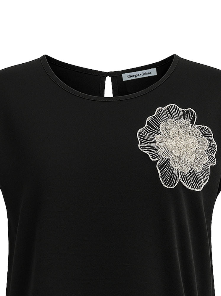 Blusa con coulisse e patch fiore