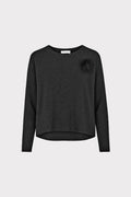 Pullover con spilla