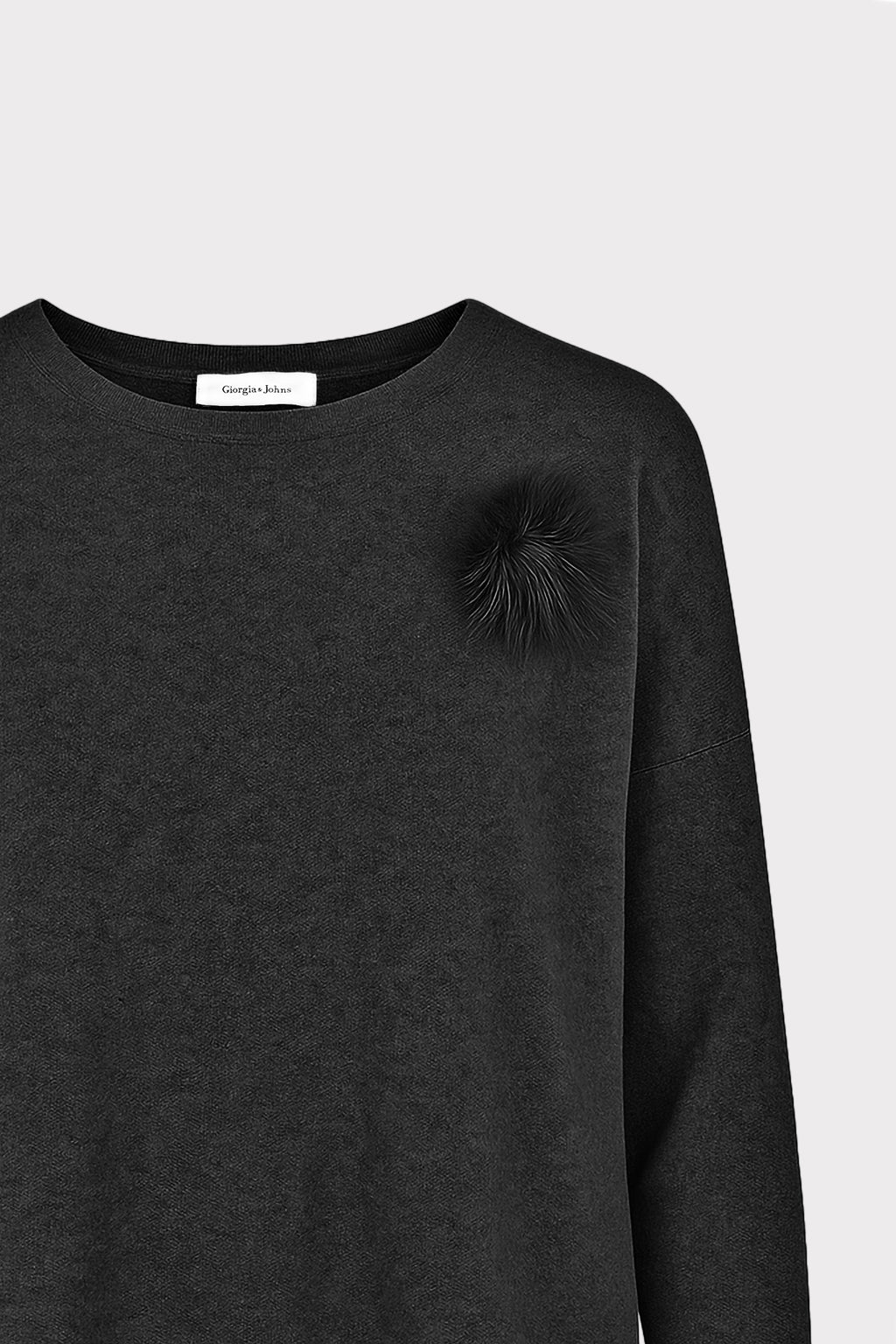 Pullover con spilla
