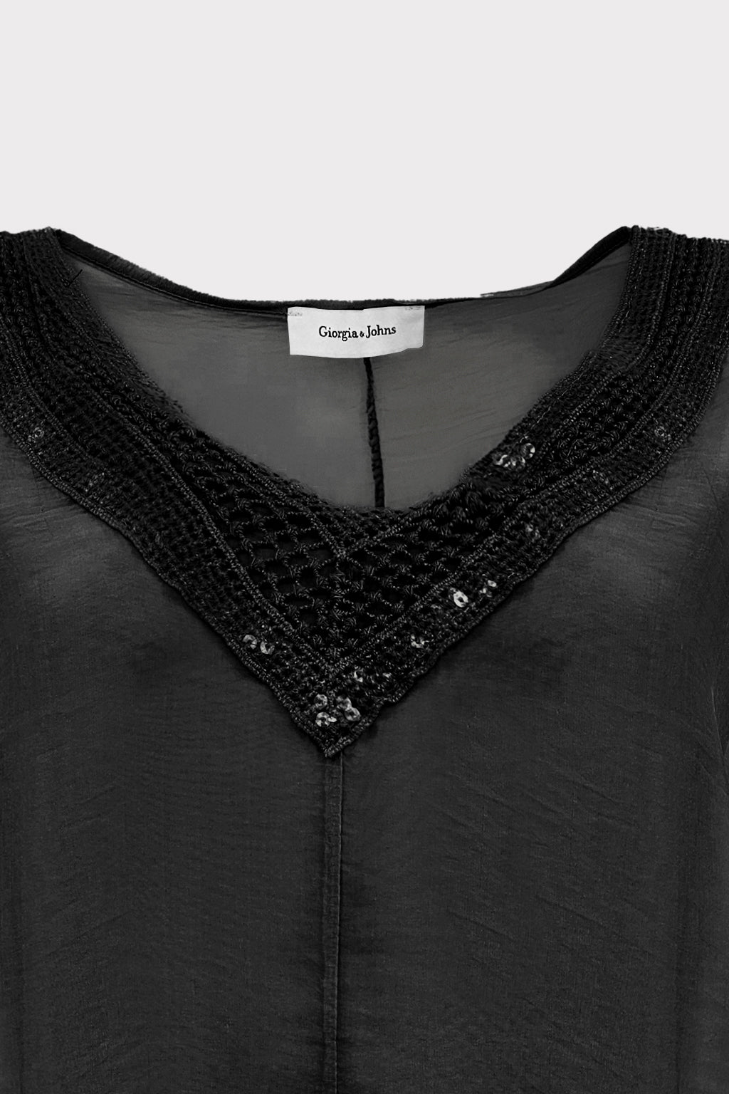 Blusa ampia passamaneria