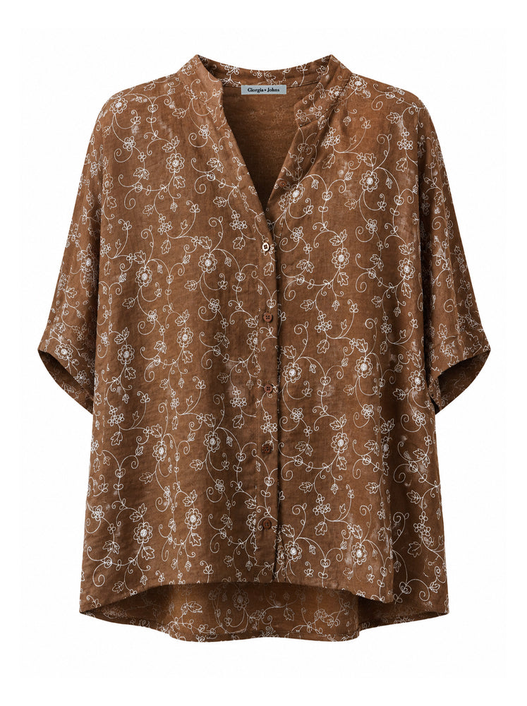 Camicia over tessuto ricamato