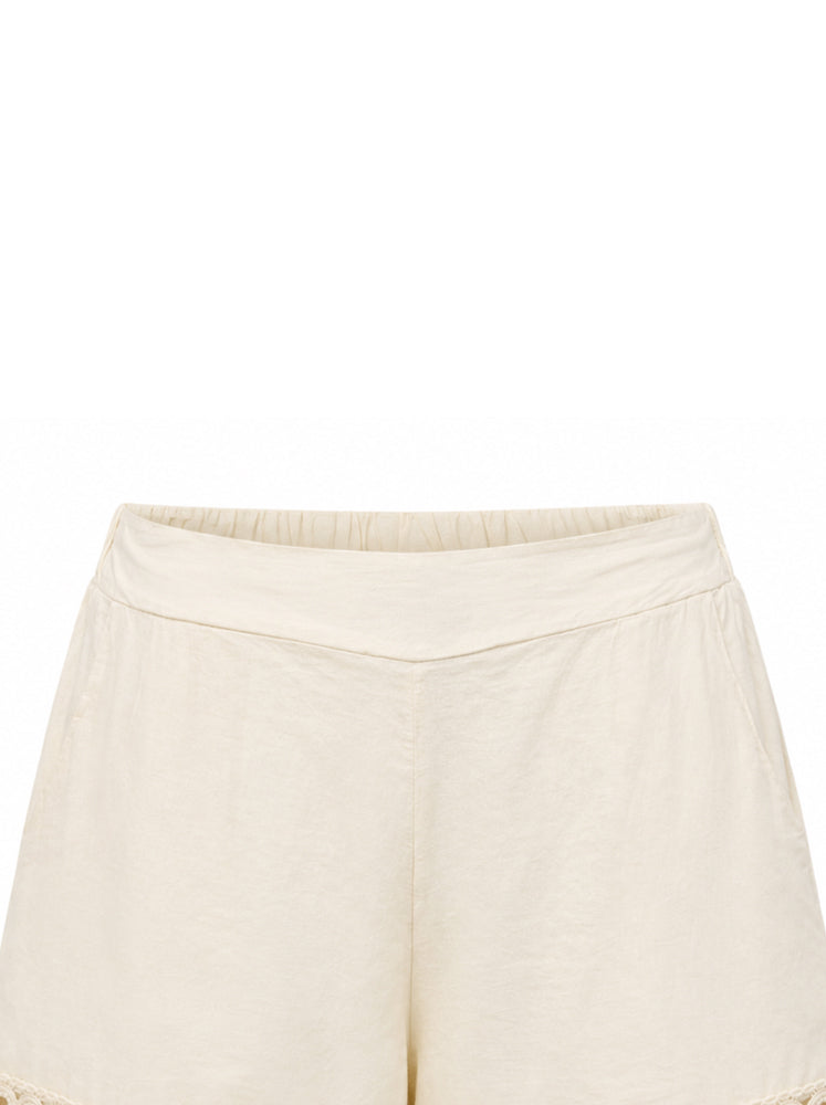 Shorts con passamaneria