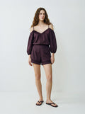 Shorts con passamaneria