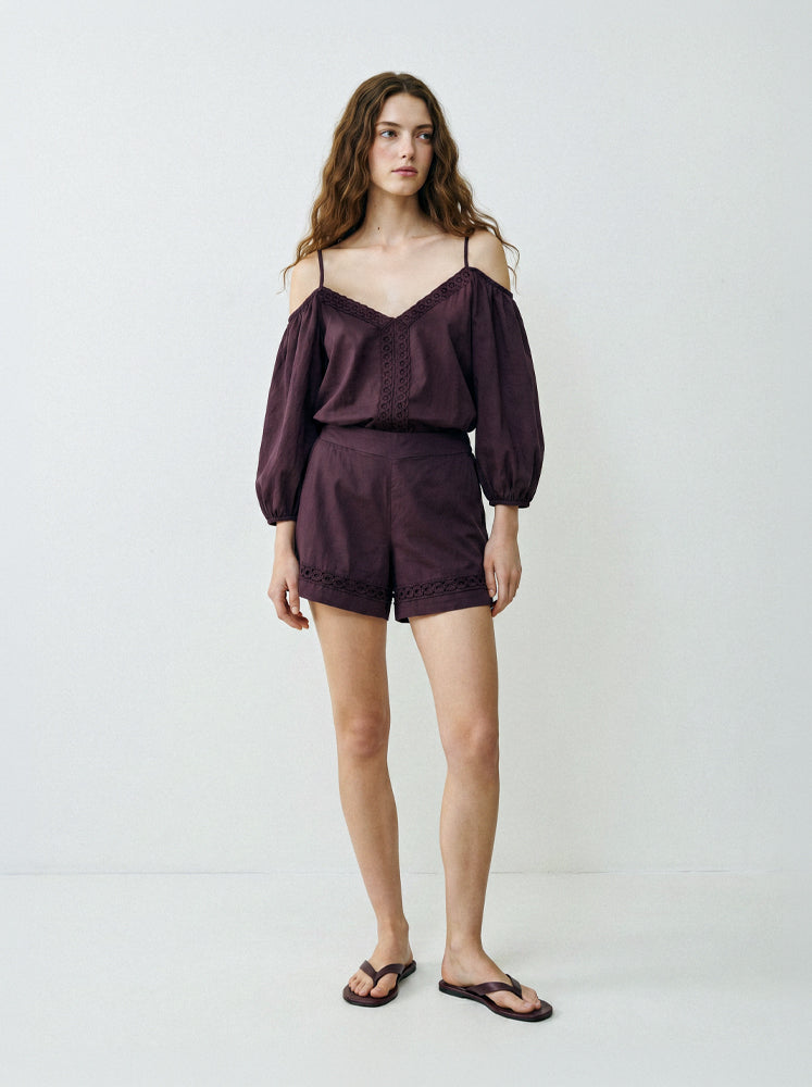 Shorts con passamaneria