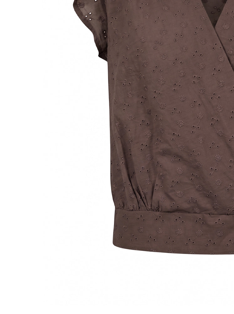 Blusa incrociata in sangallo