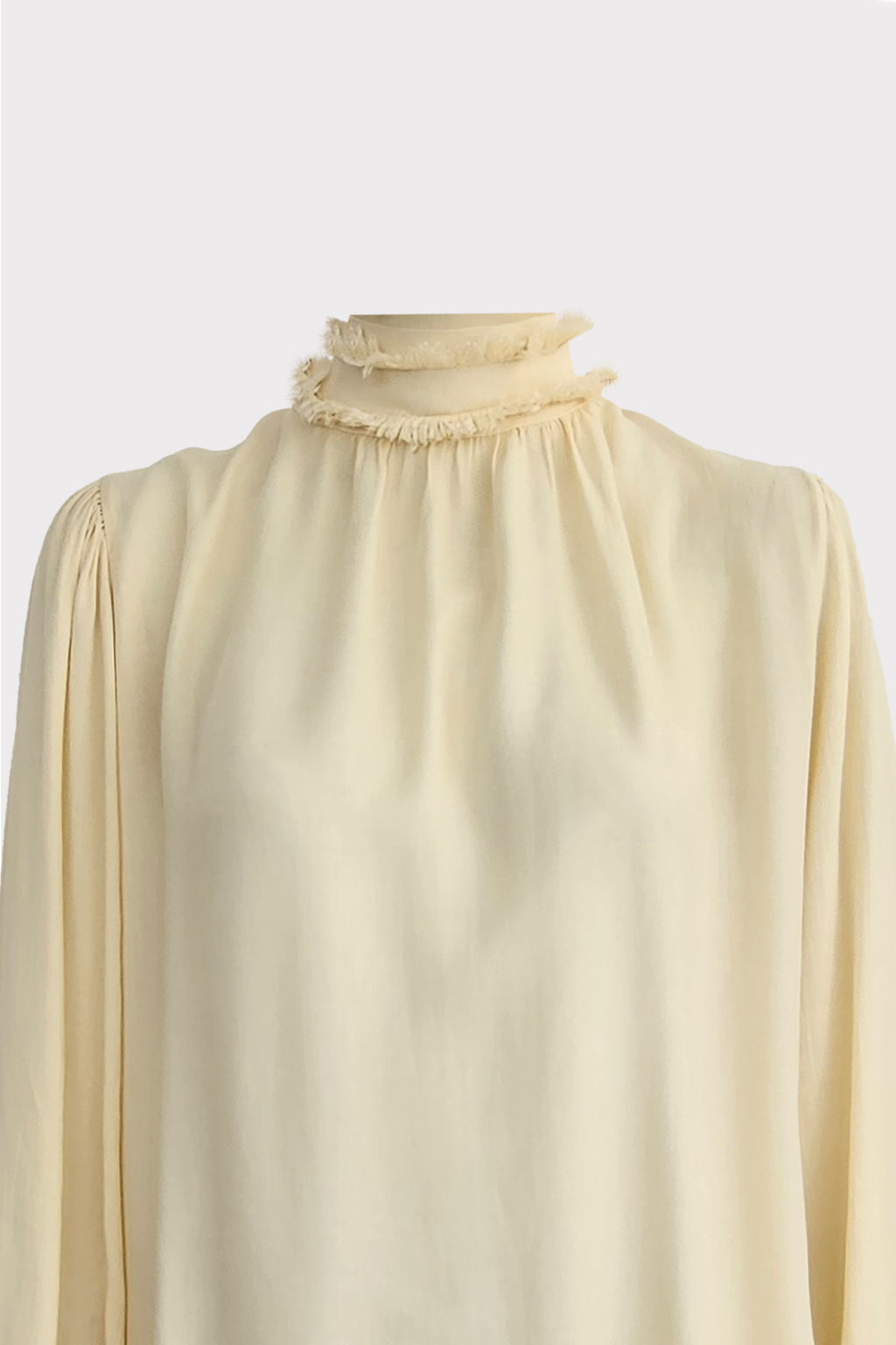 Blusa collo sfrangiato