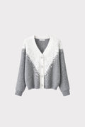 Cardigan bicolor con paillettes