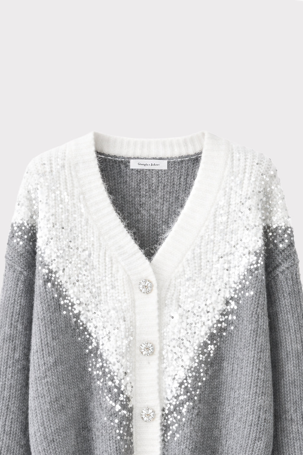 Cardigan bicolor con paillettes