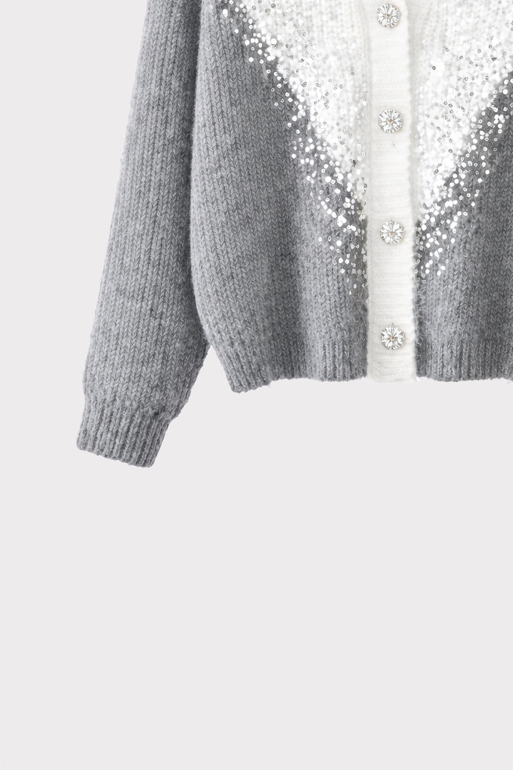 Cardigan bicolor con paillettes