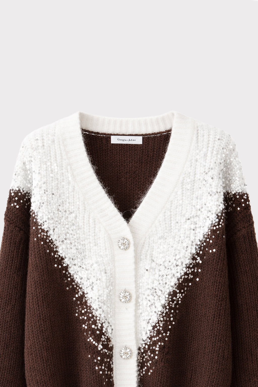 Cardigan bicolor con paillettes