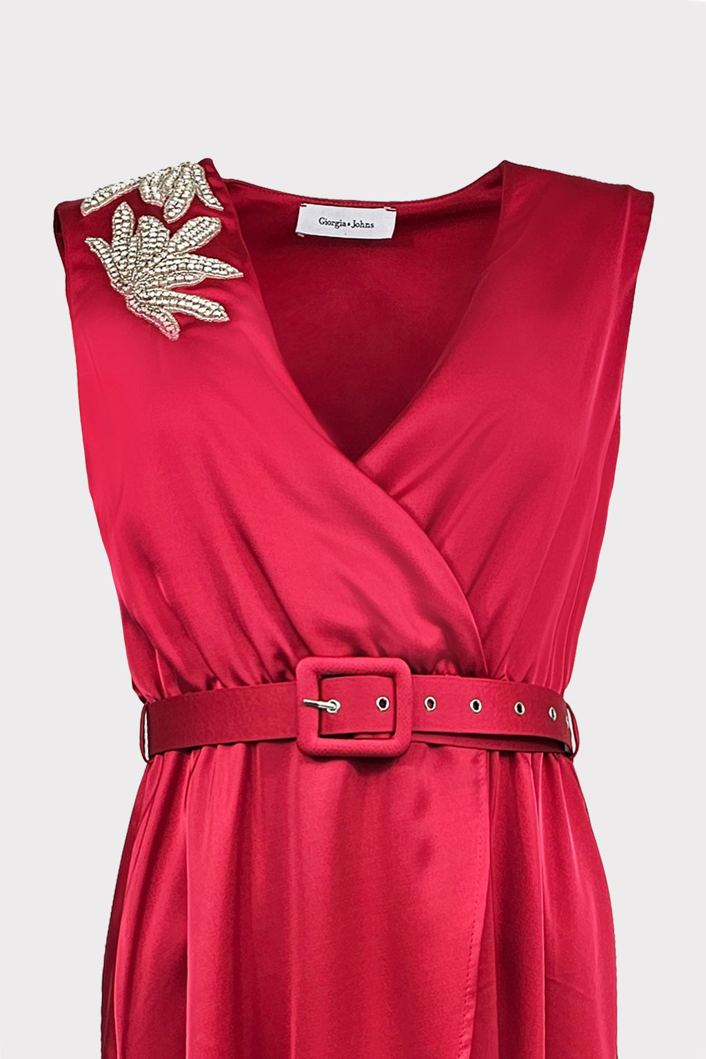Abito raso con accessorio spalle