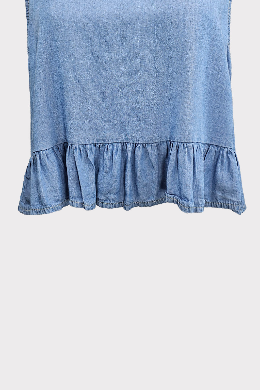 Smanicato chambray con balza