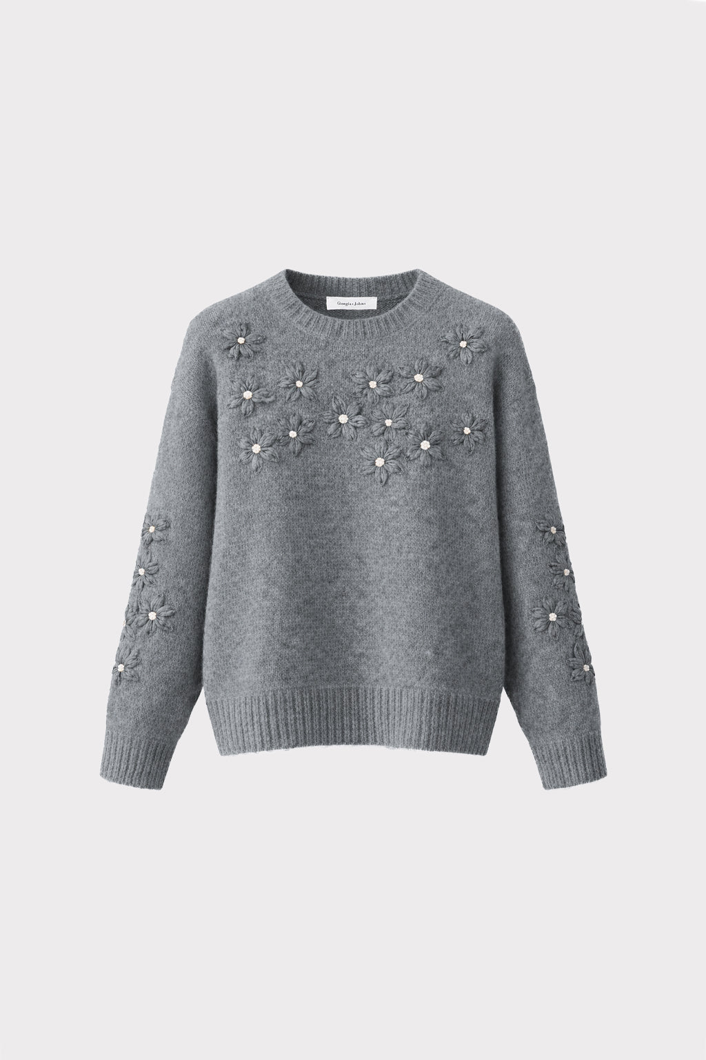 Pullover con ricami