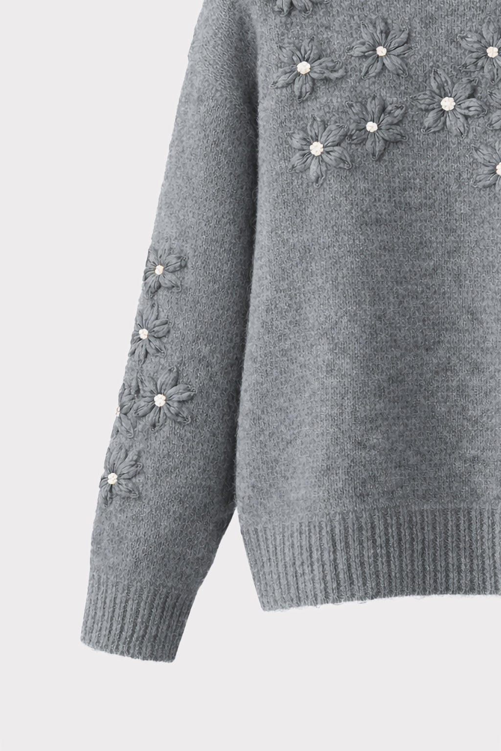 Pullover con ricami