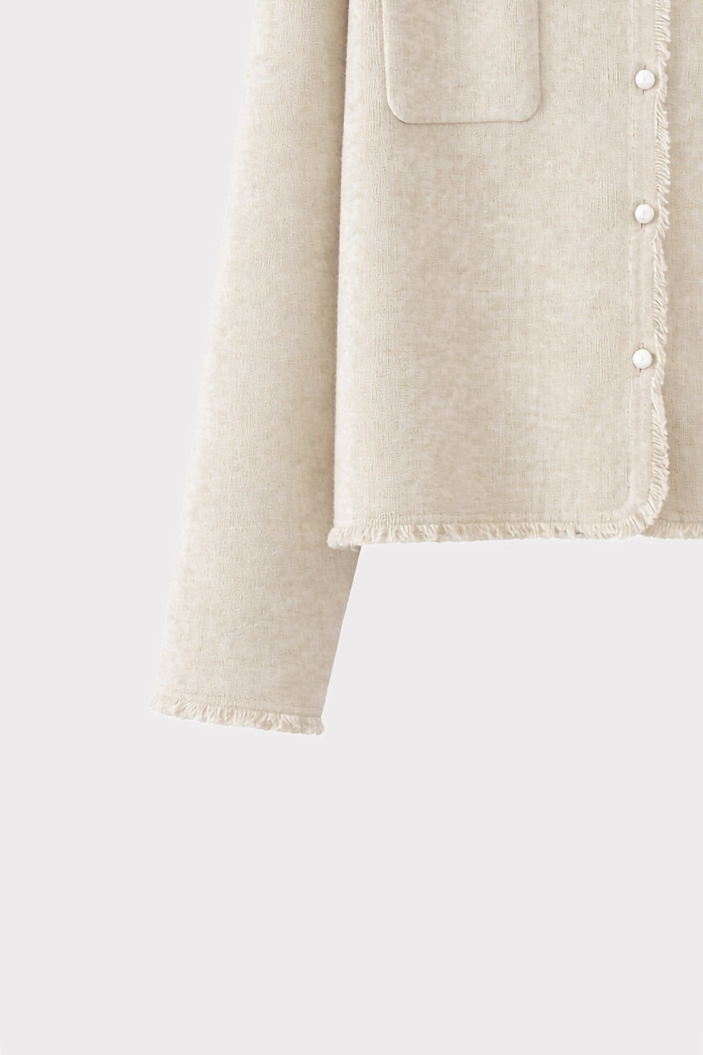 Cardigan perle bordi sfrangiati