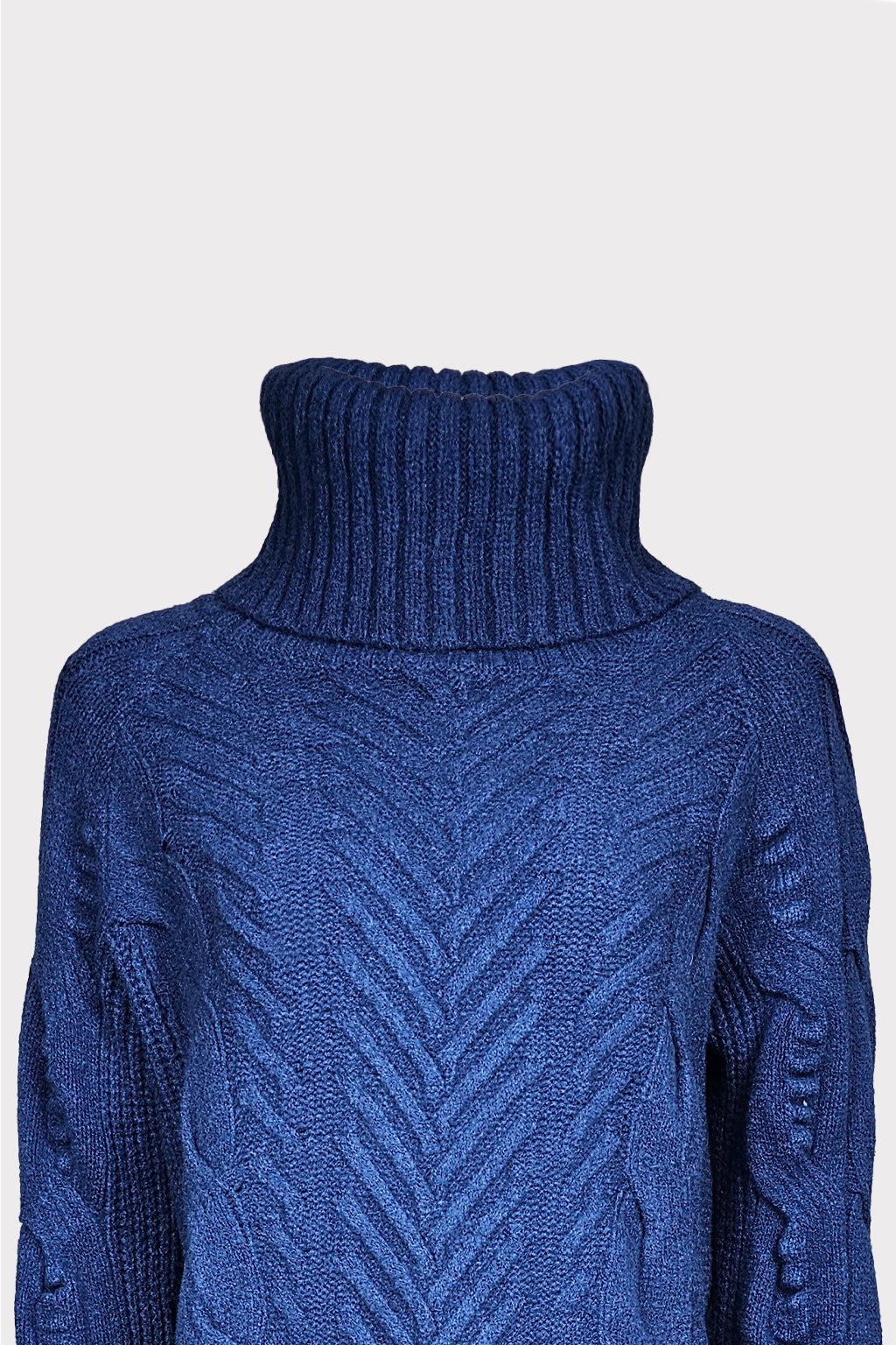 Maglia collo alto trecce