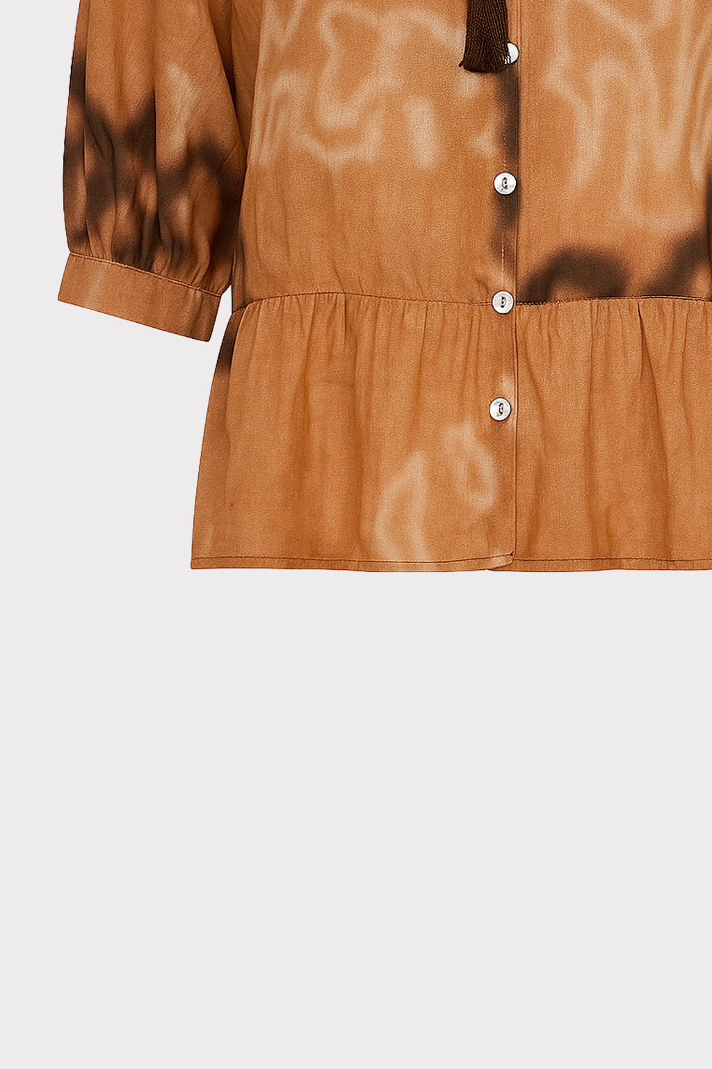 Blusa con laccio e nappine