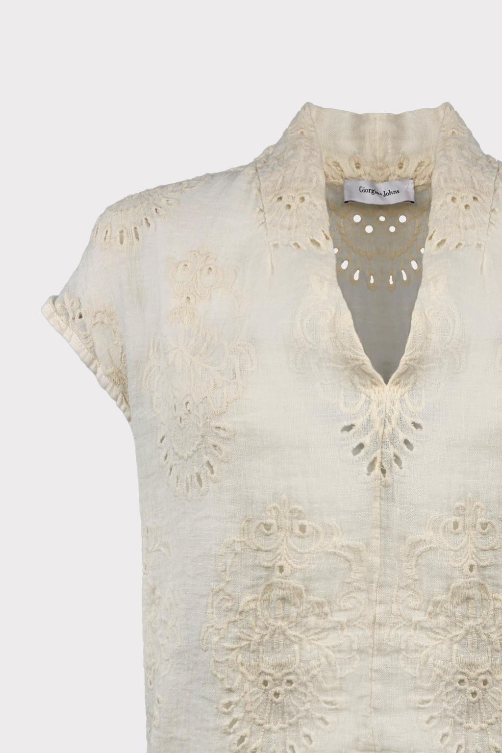 Blusa con ricamo traforato