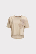Blusa dettaglio fiore e perle