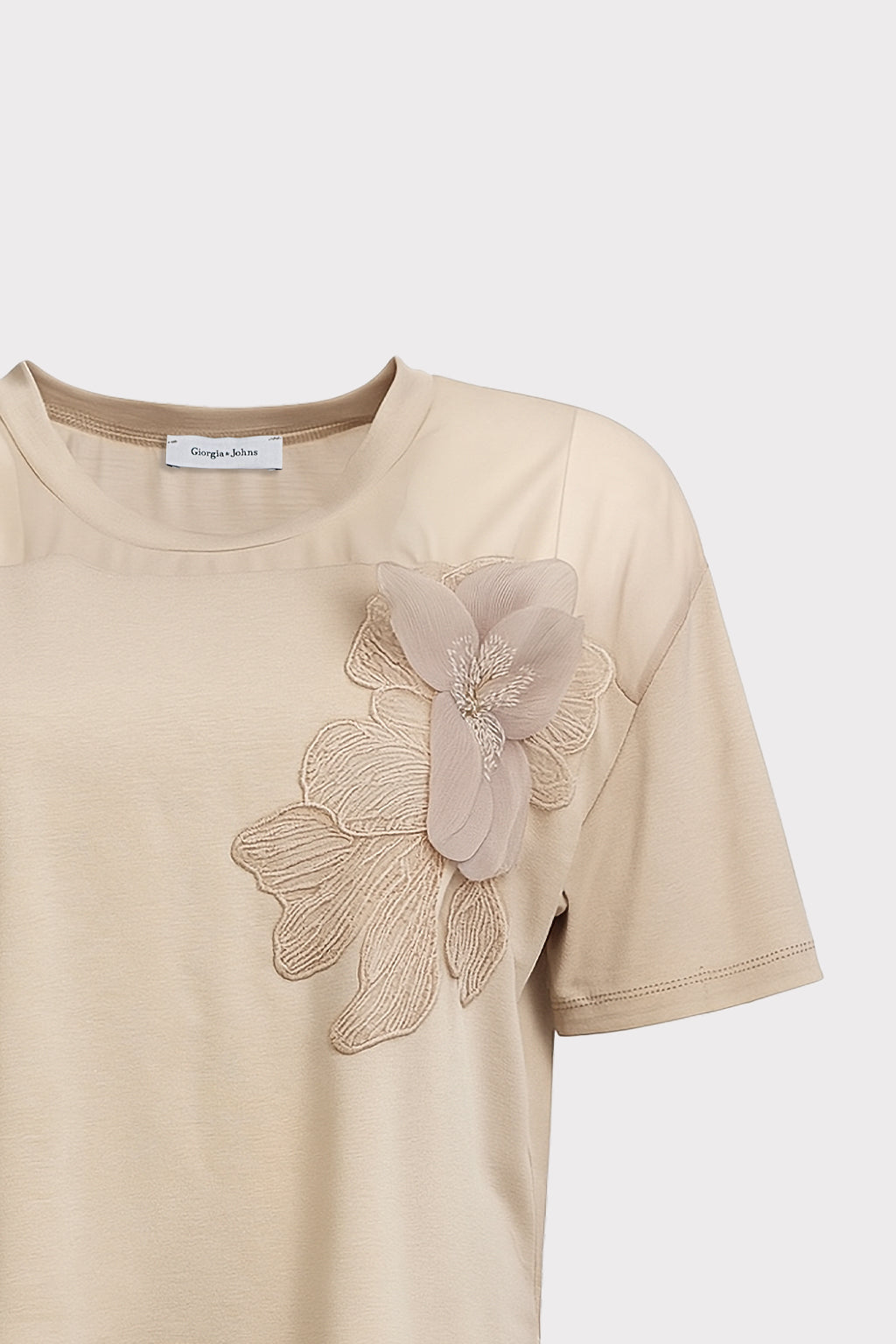 Blusa dettaglio fiore e perle