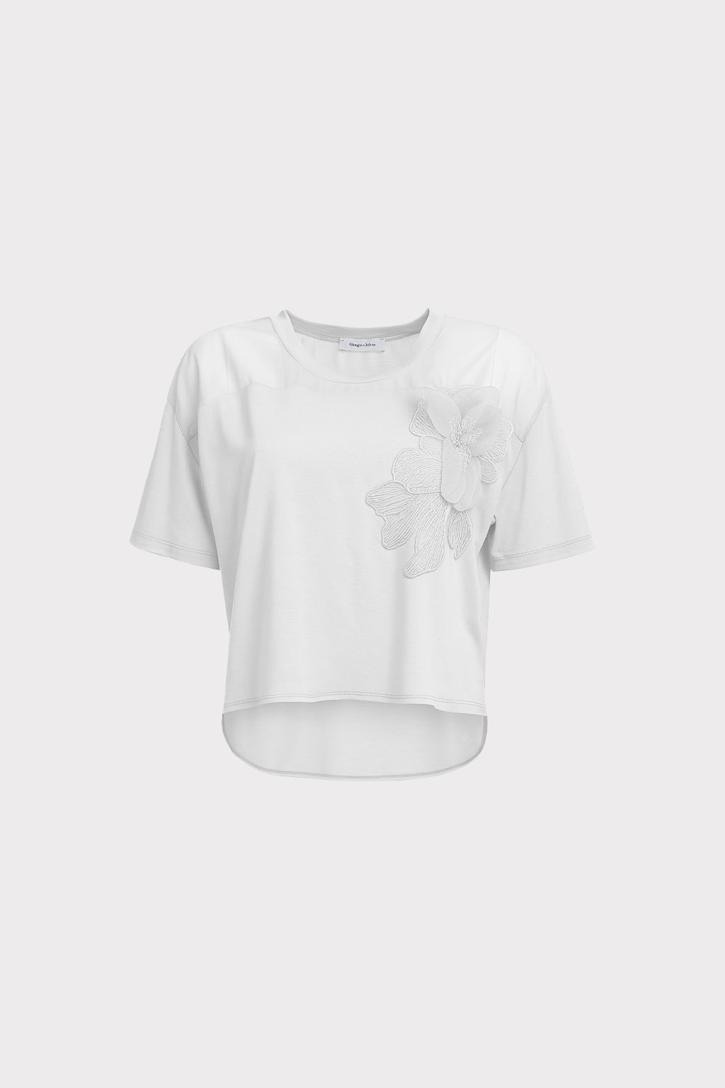 Blusa dettaglio fiore e perle