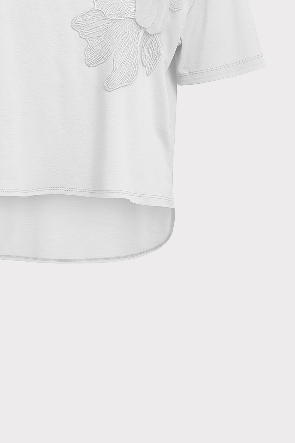 Blusa dettaglio fiore e perle
