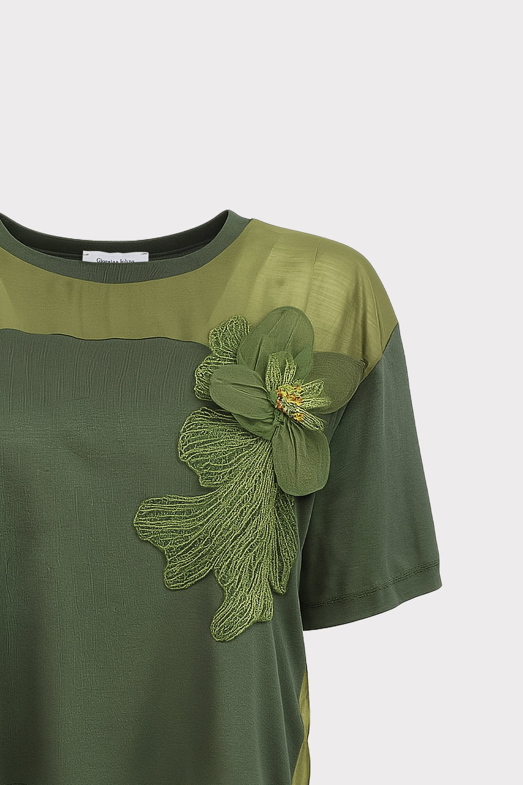 Blusa dettaglio fiore e perle