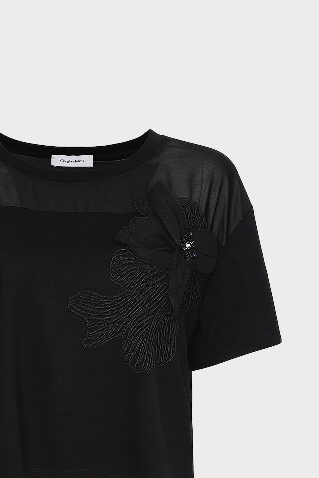 Blusa dettaglio fiore e perle