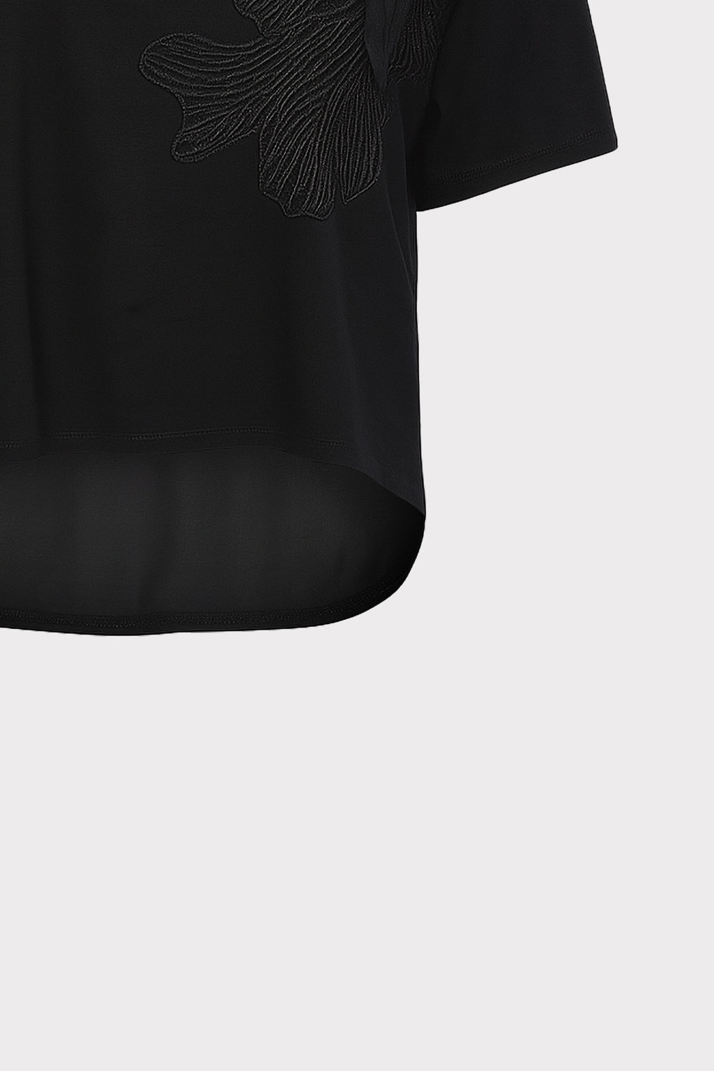 Blusa dettaglio fiore e perle