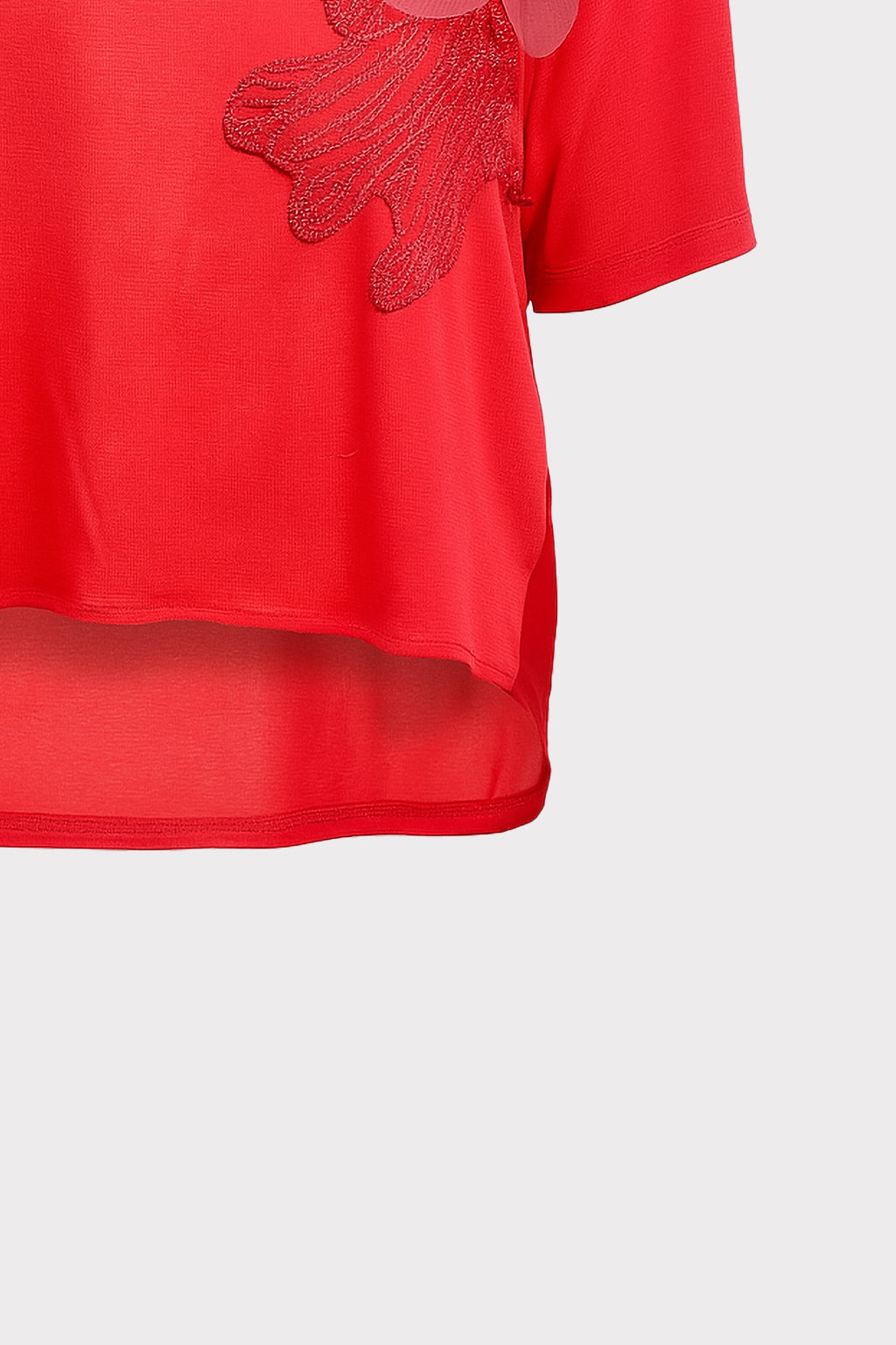 Blusa dettaglio fiore e perle
